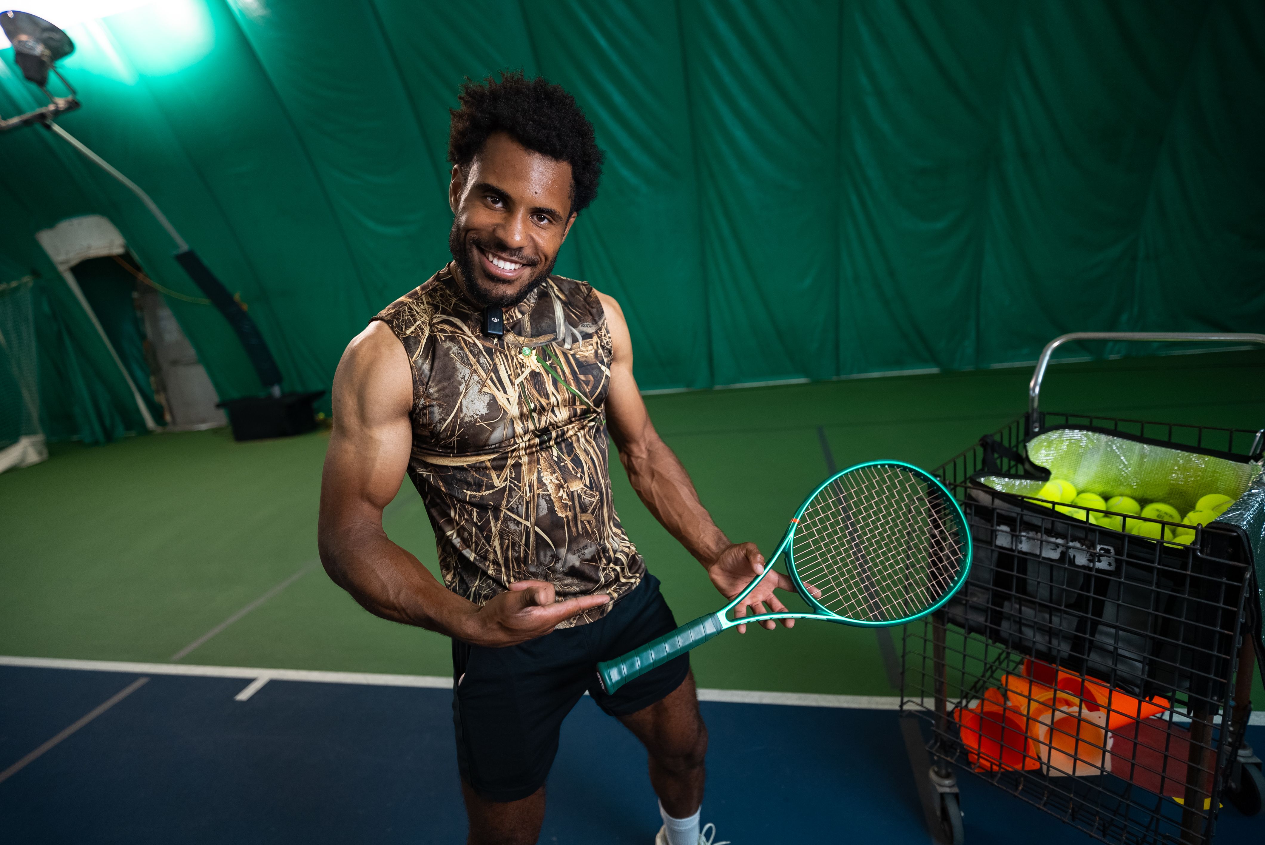 Jabari Stafford on court holding his racket