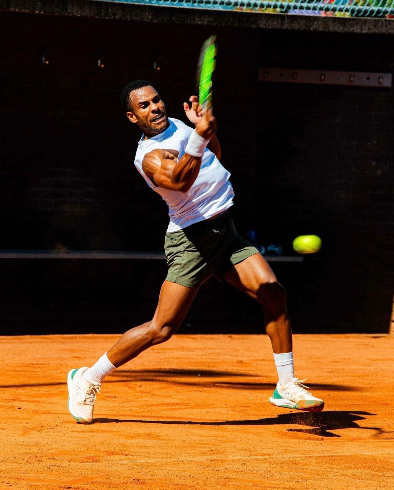 Jabari Stafford striking a forehand
